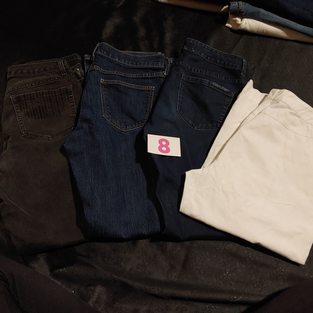 4 pairs of size 8 pants